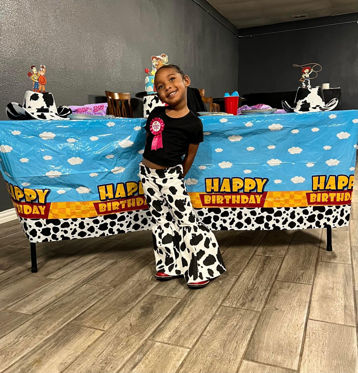 Kids Cow Print Bell Bottom Pants | Handmade Flare Pants with Ruffle Detail | Western Cowgirl Boutique Pants